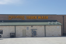 DRIVES TRUCK WASH